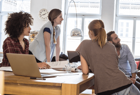 coworkers sitting at table